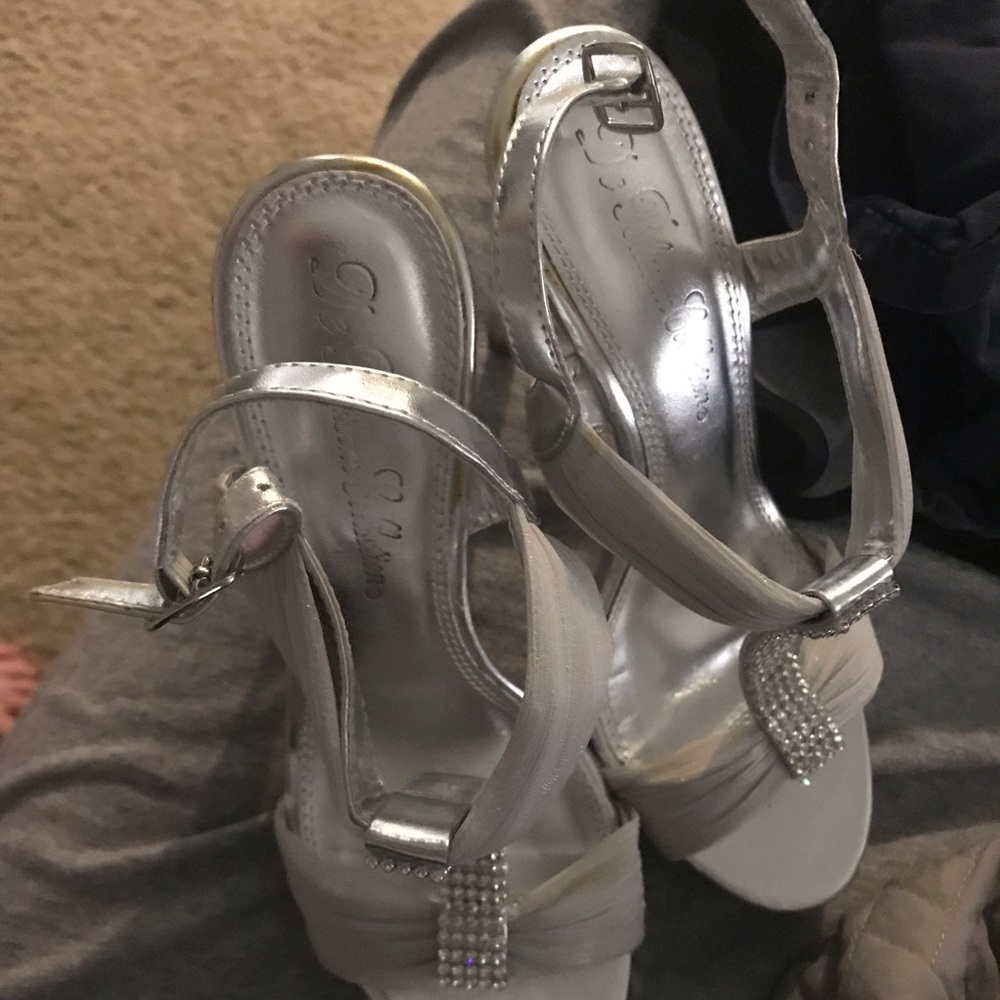 Rhinestone-encrested silver stilettos